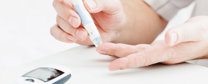 A person with diabetes checking their blood sugar